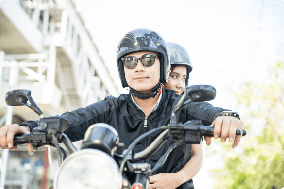 a couple of men on a motorcycle