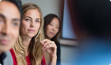 a woman looking at a man