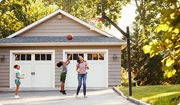 a family playing basketball