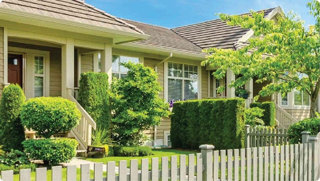 a house with a white picket fence