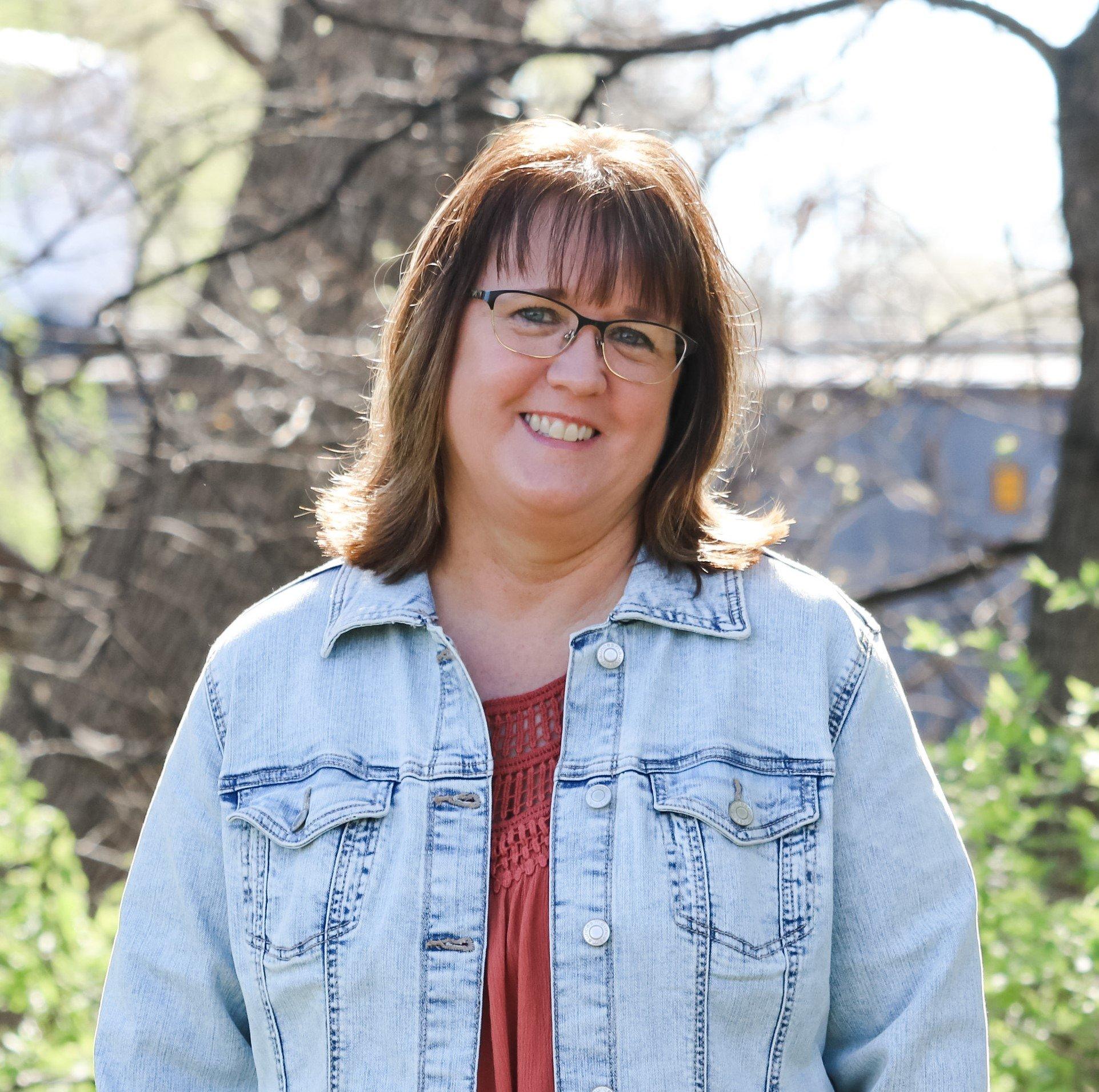 a woman wearing glasses