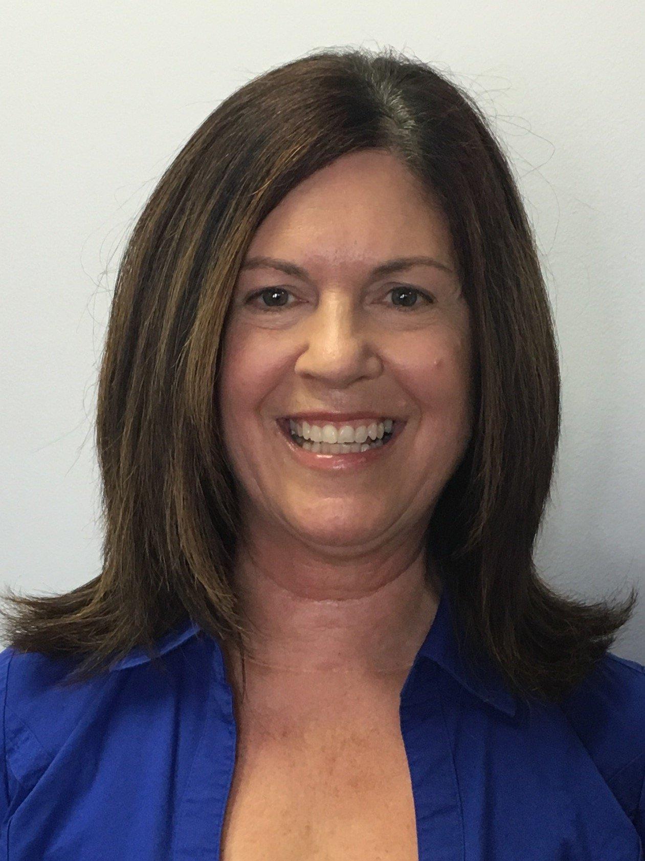 a close-up of a woman smiling