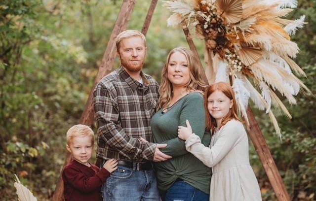 a family posing for a picture