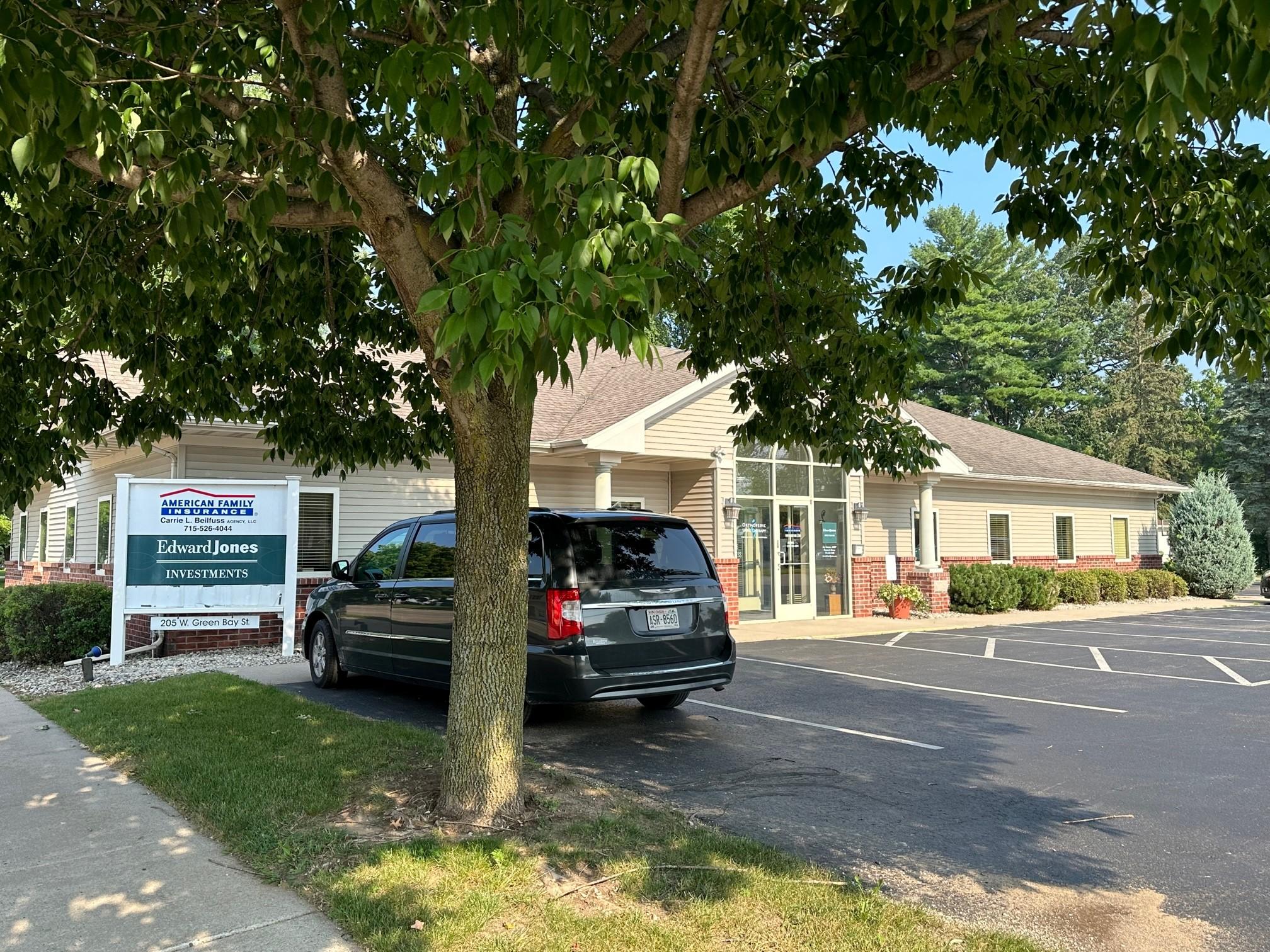 a car parked in front of a building