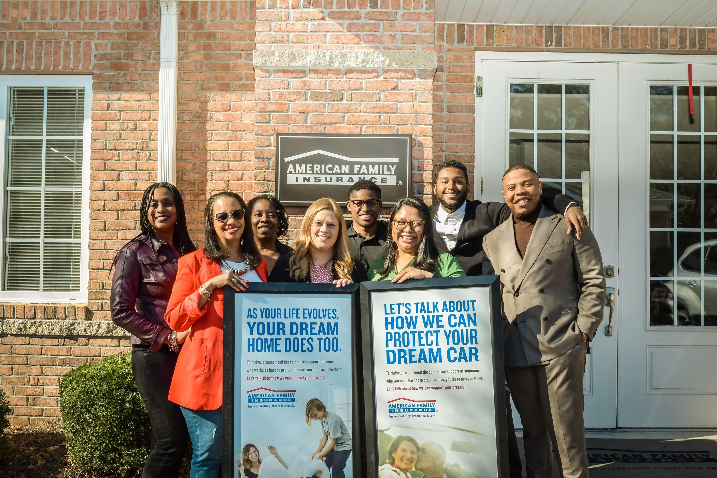 a group of people posing for a photo