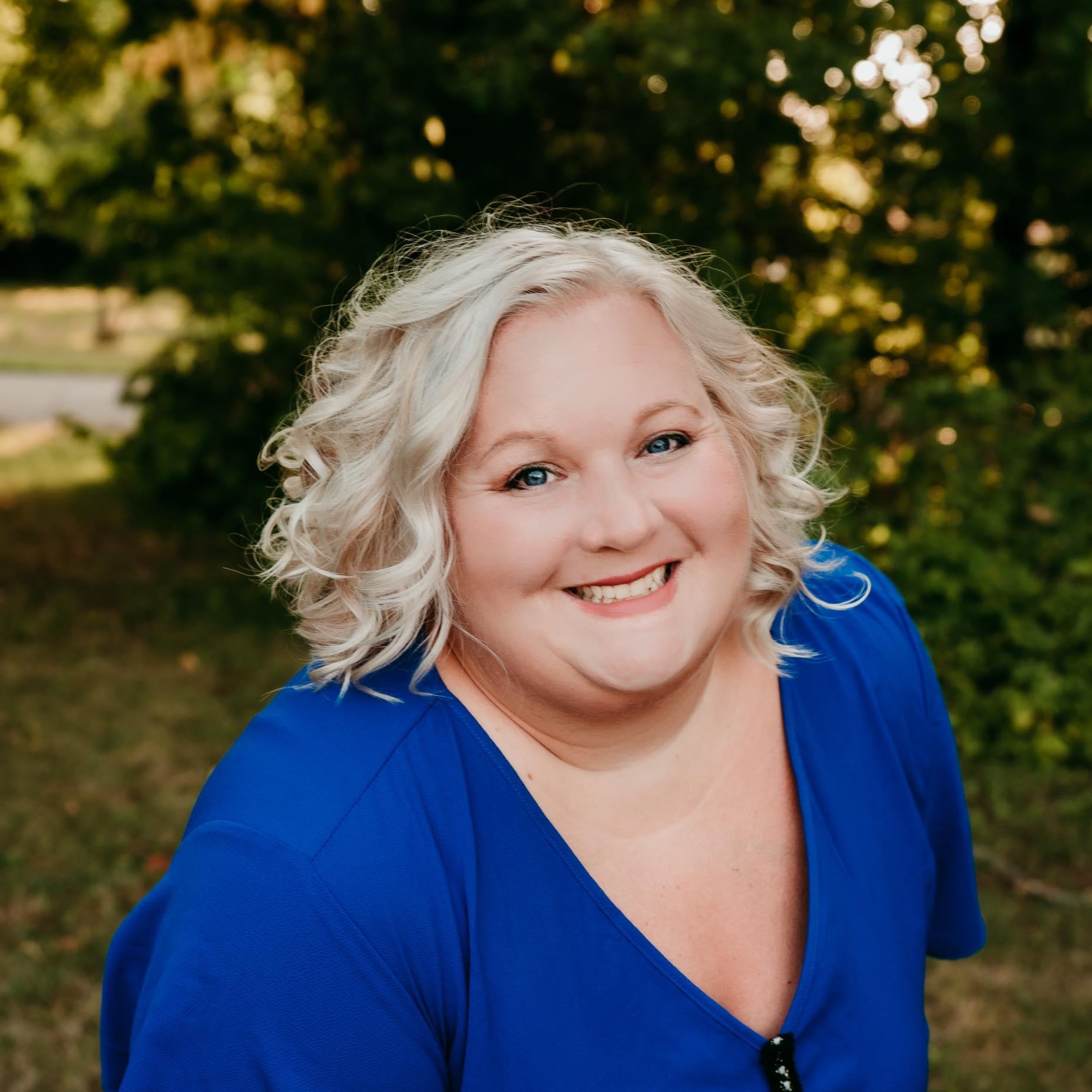 a woman smiling for the camera