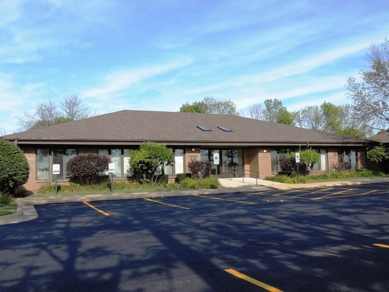 a building with a parking lot