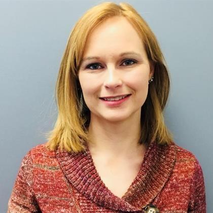 a woman smiling for the camera