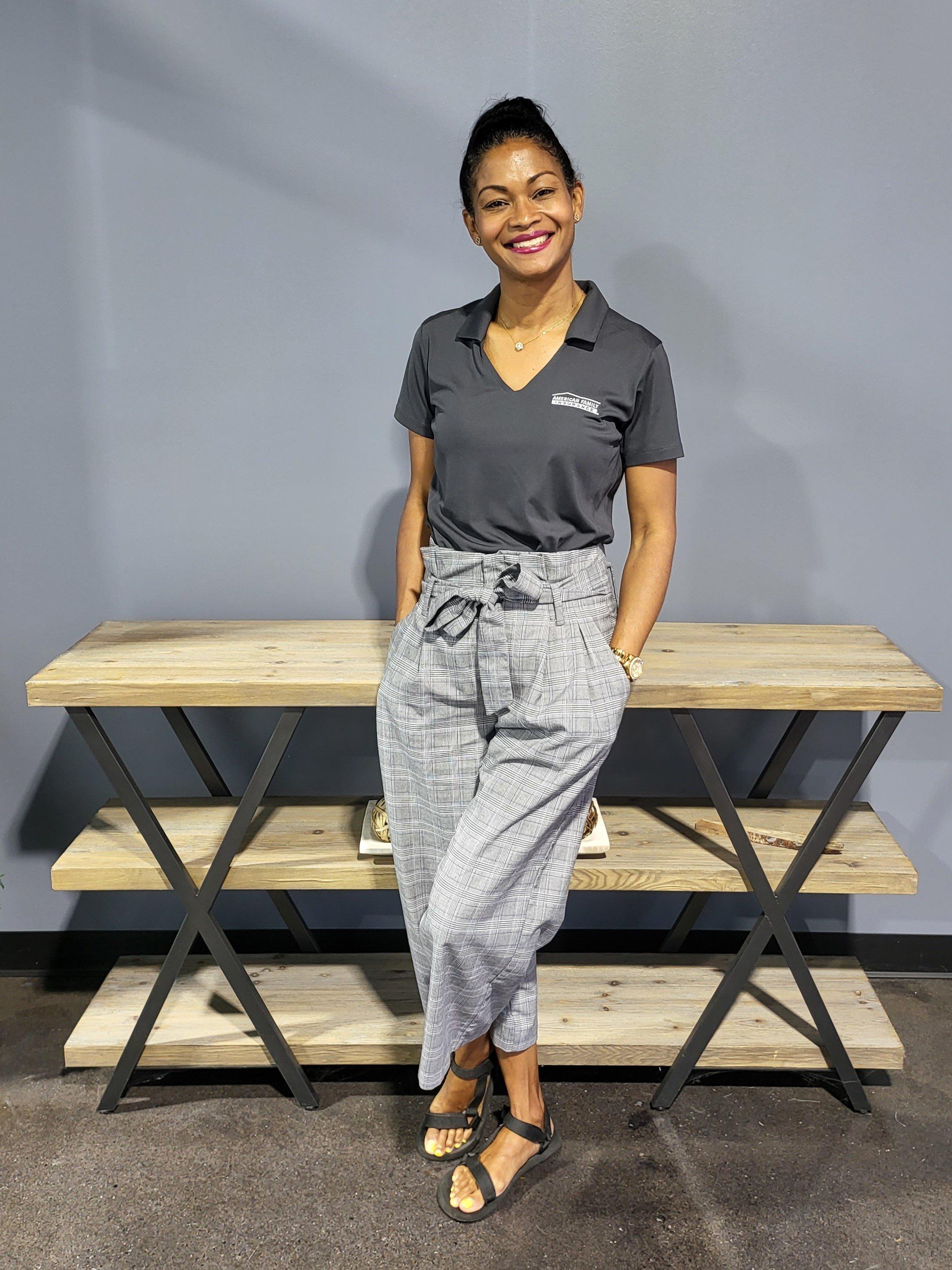 a person standing next to a bench