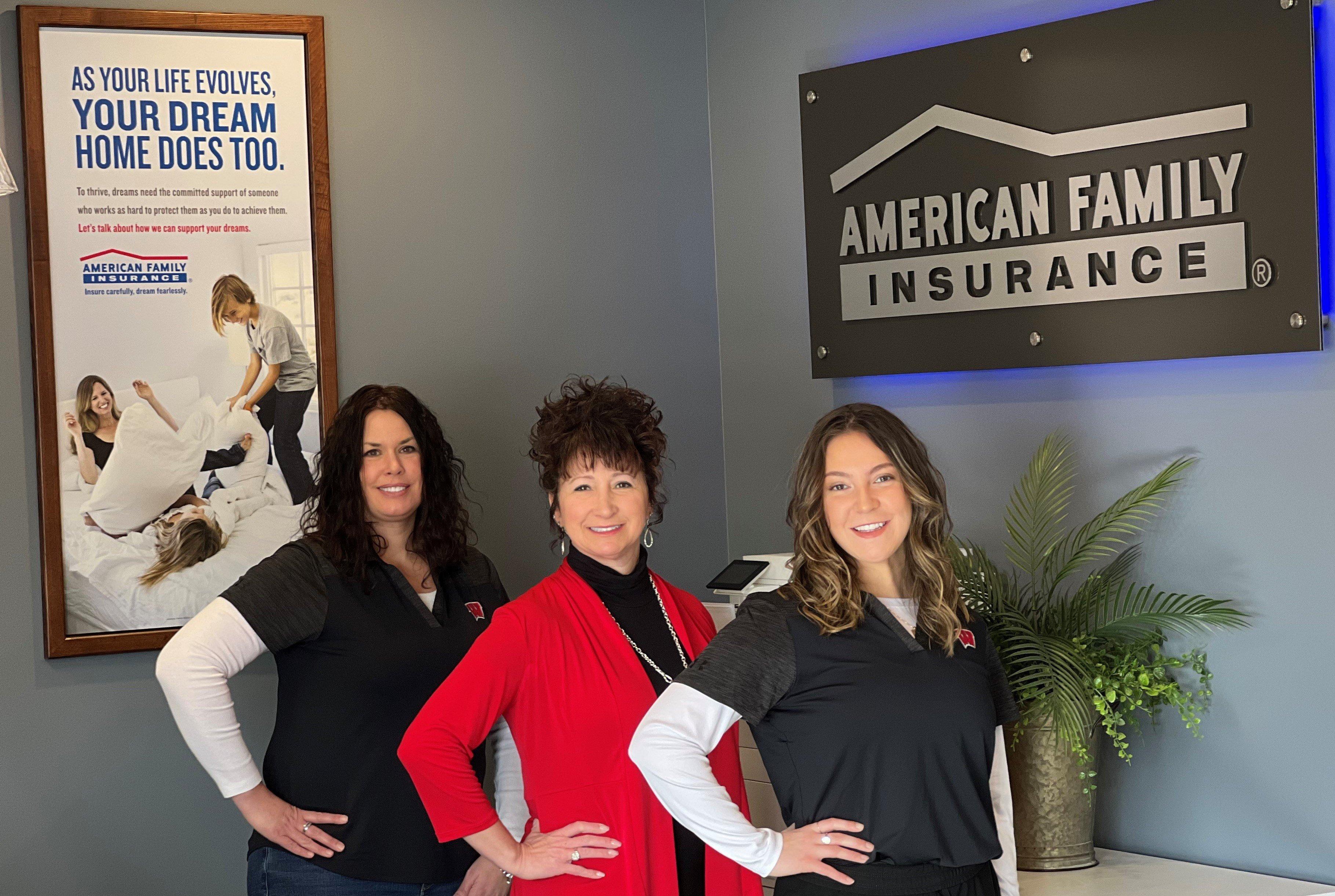 a group of women posing for a photo