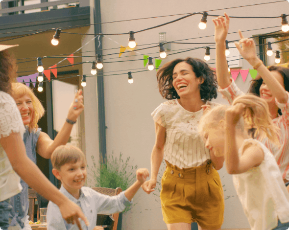 Family and friends enjoying a backyard party. 