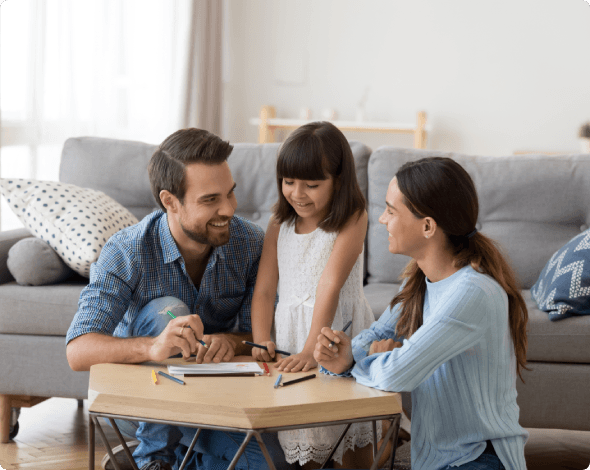 Parents drawing colors with child