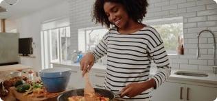 a person cooking in a kitchen