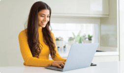 a woman working on her laptop