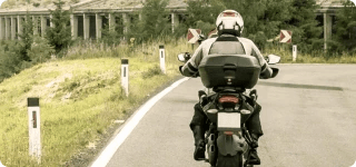 a man riding a motorcycle