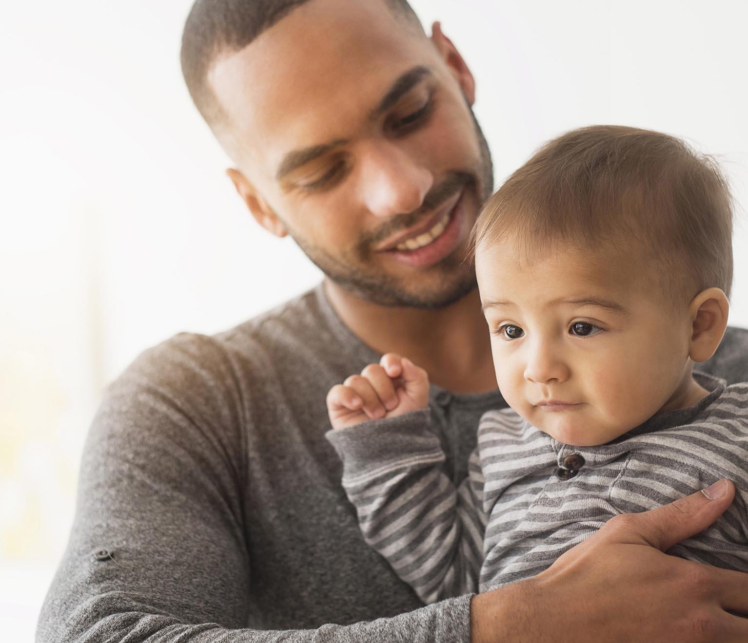 a person holding a baby